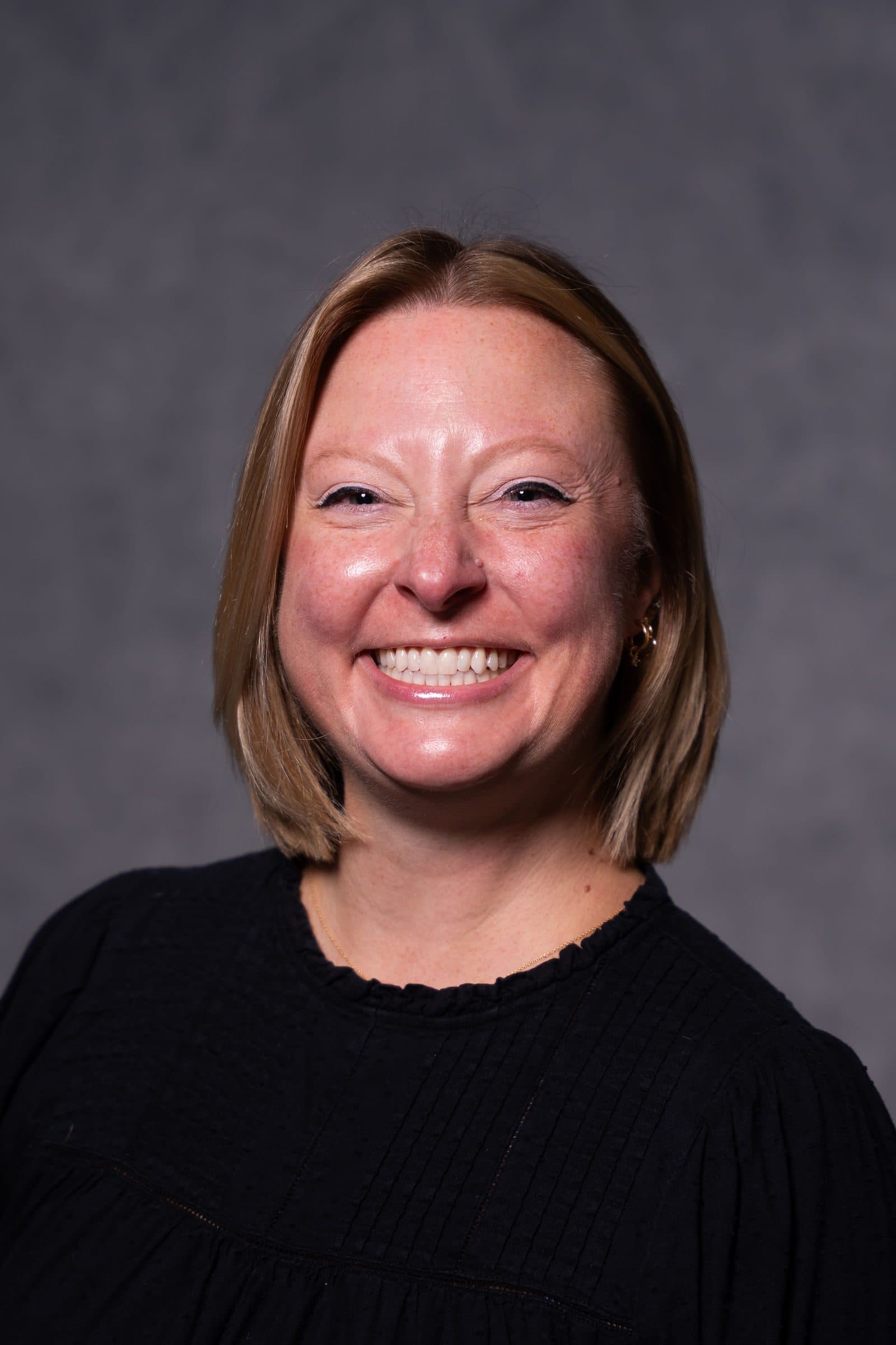 Corporate headshot of an Adams Outdoor team member