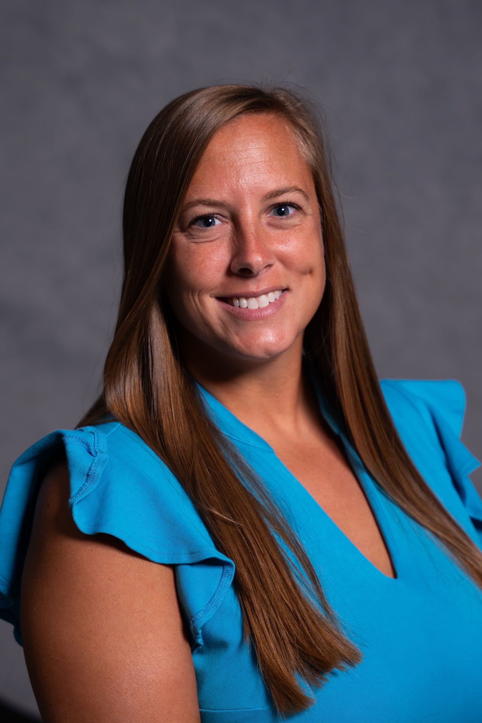 Corporate headshot of an Adams Outdoor team member