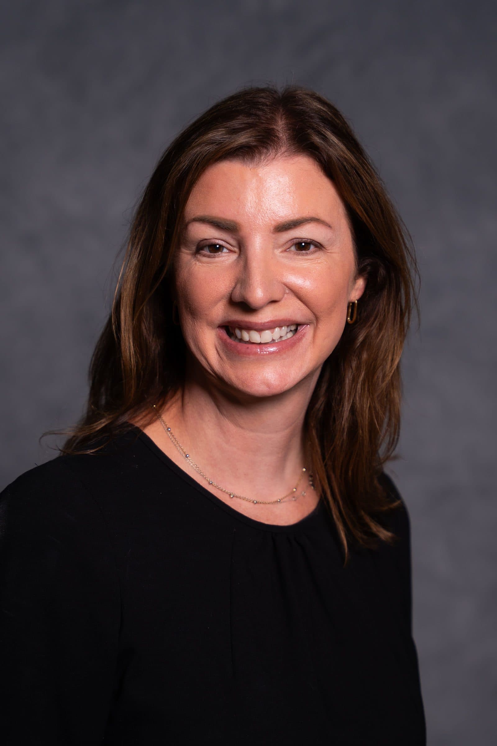 Corporate headshot of an Adams Outdoor team member