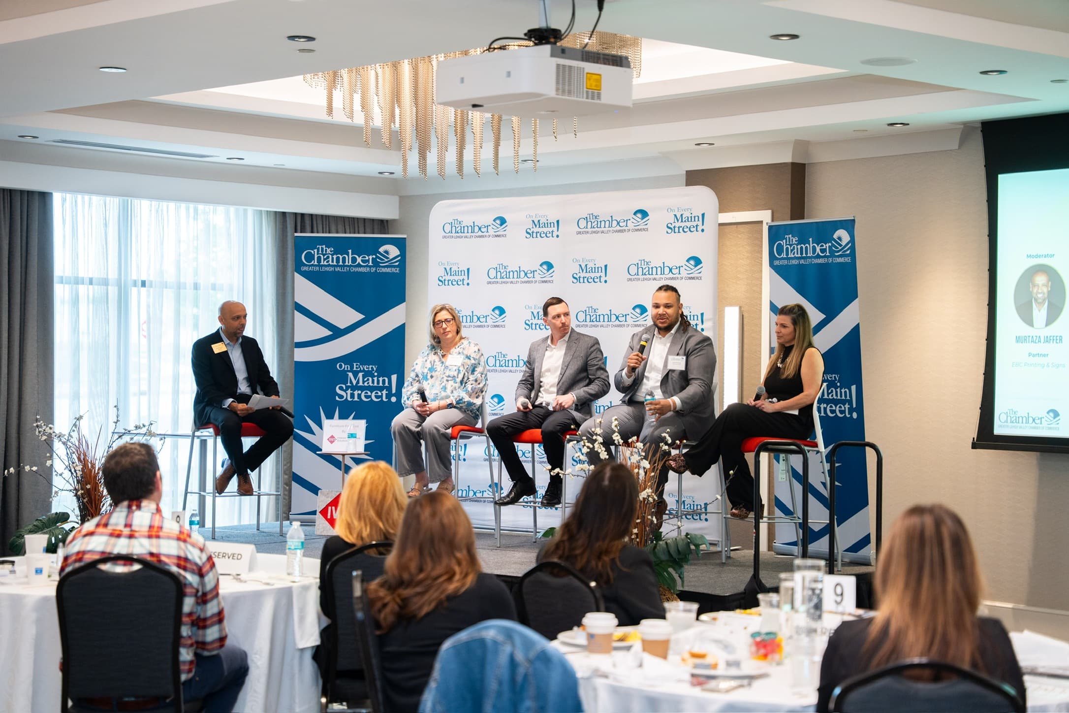 Carter McKinney speaking on a panel at a Chamber of Commerce event